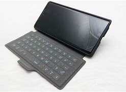 Image result for Sony Phone Blue Case Full Keyboard