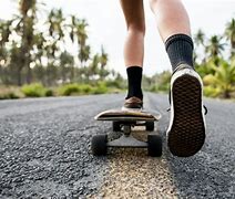 Image result for Person Riding Skatboard