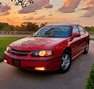 Image result for 2003 Chevy Impala Red