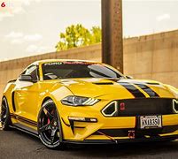 Image result for yellow mustang with black stripes