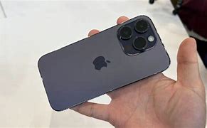Image result for iPhone 14 Purple in Hand