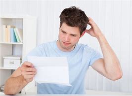 Image result for Person Looking at a Paper