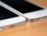 Image result for 4S vs iPhone 5S Lock Screens