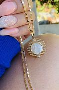 Image result for Kim Kardashian Gold Coin Necklace