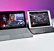 Image result for Surface Go 3 vs iPad Mini