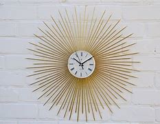 Image result for Sunburst Wall Clock Gold