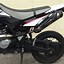 Image result for Yamaha WR 125 X Red and Black