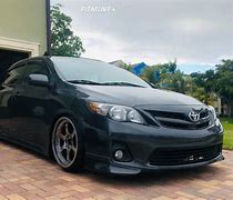 Image result for Toyota Corolla 2010 with Black Roof