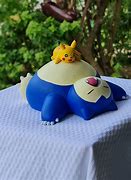 Image result for Pikachu Snorlax