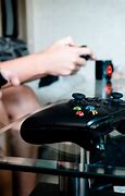 Image result for Holding Xbox One Controller