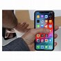 Image result for iPhone XR in a Black Person Hand