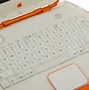 Image result for Orange Apple Laptop