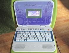 Image result for Computer Blue Toy