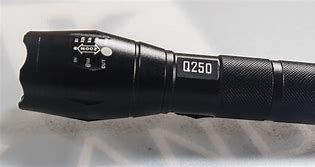 Image result for Flashlight Q250 Charger