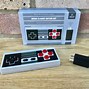 Image result for Nintendo Classic Anniversary Edition Controller versus Rio NES Classic