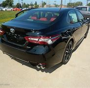 Image result for Toyota Camry Midnight Black with Red Interior