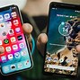 Image result for Picture of a iPhone 15 Next to an Android Phone