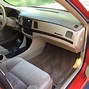 Image result for 2000 Impala Red