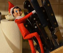 Image result for Inappropriate Elf On a Shelf with Cat
