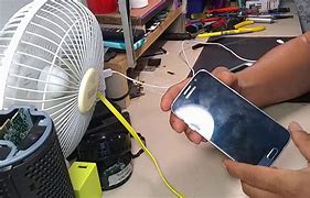 Image result for Swollen Mobile Phone Battery