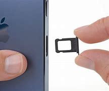 Image result for How to Take Out Sim Card From iPhone 15 Pro