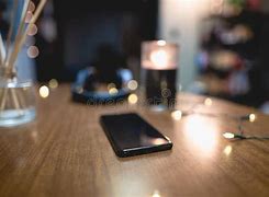 Image result for Phone On a Table