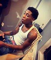 Image result for NBA Young Boy Sitting Down