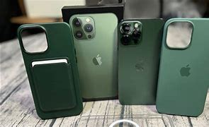 Image result for iPhone 13 in Green with a Case On It