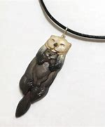 Image result for Real Otter Teeth Necklace