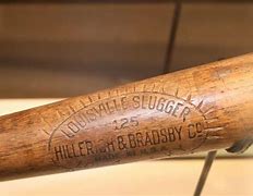 Image result for World Famous Baseball Bat