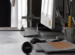 Image result for Laptop and Phone On Desk