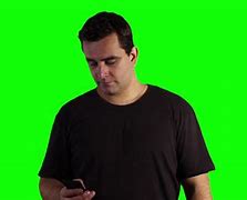 Image result for Man Looking at Phone Greenscreen