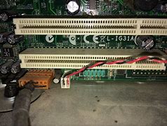 Image result for Laptop with 9 Pin Serial Port