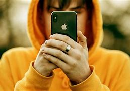 Image result for Guy Holding iPhone