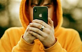 Image result for Someone Holding iPhone Green