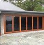 Image result for Bifold Doors Timber Cladding