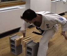 Image result for Karate Breaking 2X4