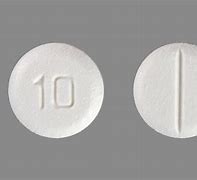 Image result for Round White Pill with 10 On It