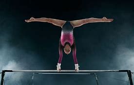 Image result for Gymnastics Bar Moves
