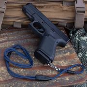 Image result for Glock Lanyard Clip