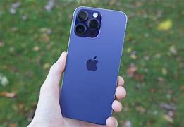 Image result for Black Hand Holding iPhone Gold13 Pro Max