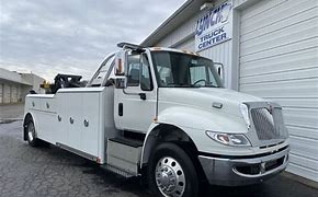 Image result for International 4000 Series Tow Truck