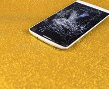 Image result for A Picture of a Person Holding a Cracked Phone