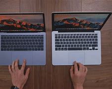 Image result for MacBook Pro 13 Silver vs Space Gray
