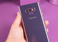 Image result for Holding Samsung Note 9