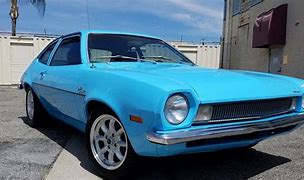 Image result for Ford Pinto with a Cop