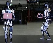 Image result for Tesla Assembly Robot