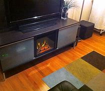 Image result for 70 TV Stand Fireplace