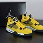 Image result for Jordan 4 Blue Yellow and Grey
