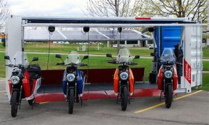 Image result for Motorcycle Charging Points with a PV Structure